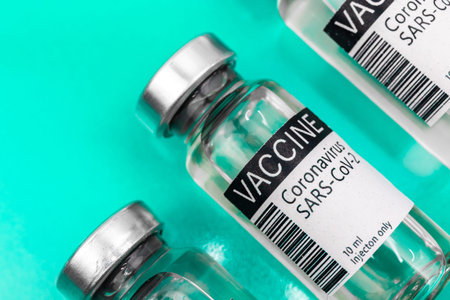 Bottles coronavirus covid-19 sars-cov-2 vaccine, ampoules for vaccination concept, close-up