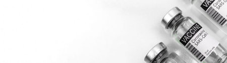 Covid vaccines banner on the white background, copy space, panoramic photo