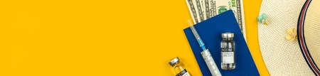Summer travel after covid-19, vaccination for vacation concept banner with vaccine vials and money, passport, copy space and top viewの写真素材