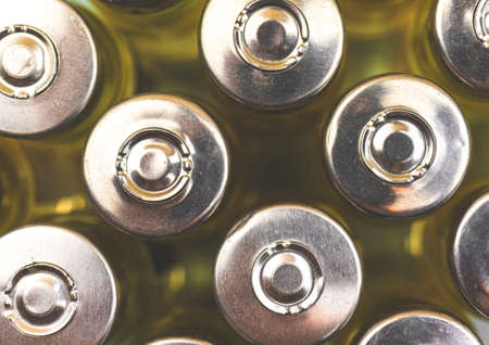 Vaccine vials top view, process of development and manufacture covid-19 vaccine, science and laboratory research conceptの写真素材