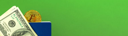 Bitcoin exchange banner with US dollars in wallet, crypto currency green office desk background with...