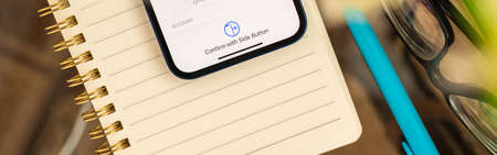 Kharkov, Ukraine - April 27, 2021: Confirmation of purchase at App store on Apple iPhone 12のeditorial素材