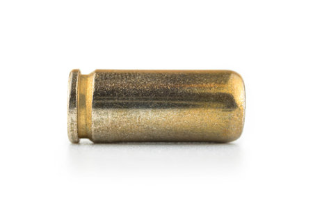 Close up of bullet for 9mm pistol, ammo for a gun, isolated on white backgroundの写真素材