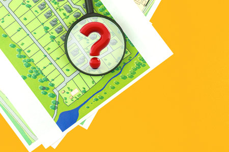 Real estate search with a map, concept choose building plot of land for house construction, question...