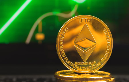 Ethereum coin on background of green stock chart, close-up view photo