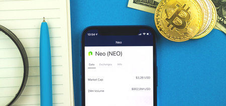 NEO crypto currency logo and symbol on the screen of modern mobile phone, business finance banner...