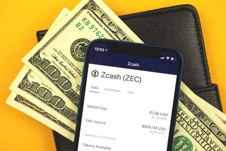 Zcash ZEC crypto currency logo and symbol on the screen, trading and exchange finance concept backgroundの写真素材