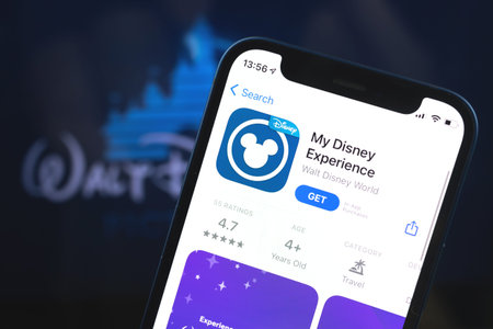 Kharkov, Ukraine - May 28, 2021: My Disney Experience app in the App Store on background of the...