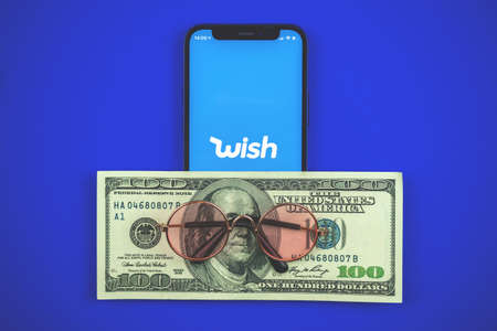 Kharkov, Ukraine - May 28, 2021: Close-up photo of Wish app logo on screenのeditorial素材