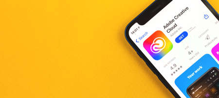 Kharkov, Ukraine - May 28, 2021: Mobile Adobe Creative Cloud icon close up, banner with copy spaceのeditorial素材