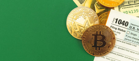 Working office desktop with tax forms and bitcoin crypto currency cgolden coins, copy space, banner...