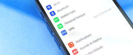 Kharkov, Ukraine - June 20, 2021: VPN setting on Apple iPhone 12 screen, bannerのeditorial素材