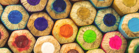 Banner with messy aasortment color drawing pencils close-up, art background web design concept photoの写真素材