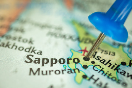 Location Sapporo on Hokkaido island in Japan, travel map with push pin point marker closeup, Asia...