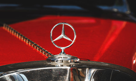 Kharkov, Ukaine - July 9, 2021: Old classic car Mercedes and logo close-up, luxury emblem photo