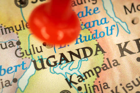 Location Uganda, map with push pin closeup, travel and journey concept with marker, Africaの写真素材