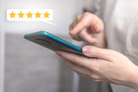 Woman touch the screen with five star rating, rate the service with feedback concept, customer with...