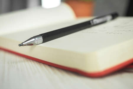 Artist pencil sketch art supplies background photo, notebook and pencil on creative workspaceの写真素材