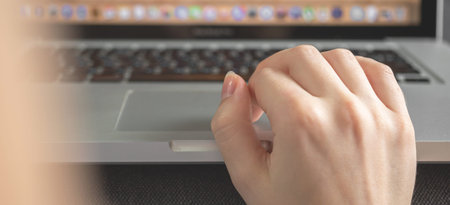 Woman hand using laptop keyboard banner. Businesswoman or student using computer at home. Online...