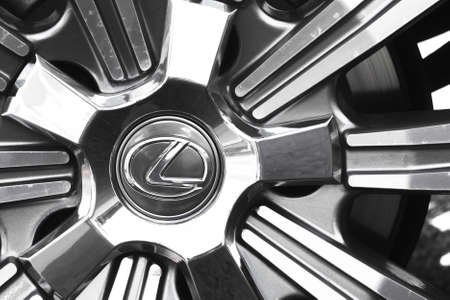 Kharkov, Ukraine - September 13, 2021: Close-up Lexus brand logo on a black car wheel background, emblem, symbolのeditorial素材