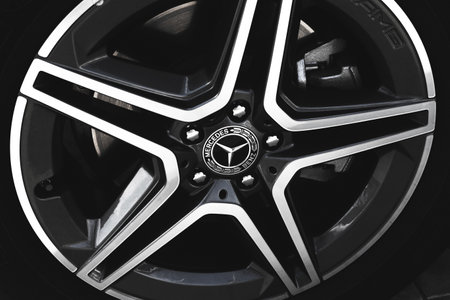 Kharkov, Ukraine - September 13, 2021: Mercedes-Benz brand logo on a car wheel background, emblem, symbol close-upのeditorial素材