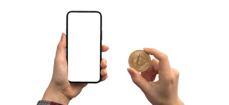 Financial payment with bitcoin and mobile phone, blank white screen mockup, hands with...