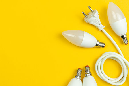 Energy efficiency. LED light bulbs and electrical power cable with EU plug. Save the planet, energy...