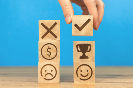 Concept of business strategy. Creative solutions and success. Hand arranging wooden cubes with icons