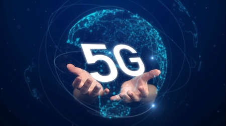 5G network. Concept of future future of wireless systems, high speed mobile internet, global technology. Hands with 5G symbol. Businessの写真素材