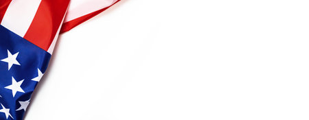 USA flag on a white background banner. Top view, copy space. American flag for Memorial Day, 4th of...
