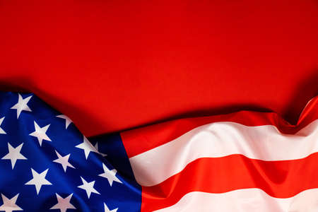 Flag of the United States of America on a red backgroundの写真素材