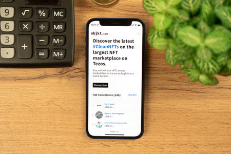 Kharkov, Ukraine - December 20, 2021: Objkt.com NFT marketplace website on a mobile phone screen