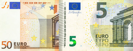 Euro banknotes (five and fifty denomination photo). Macro view of paper money