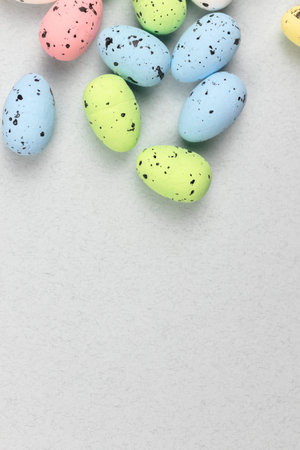 Colorful easter eggs on a flat background. Spring holiday design and greeting concept. top view,...