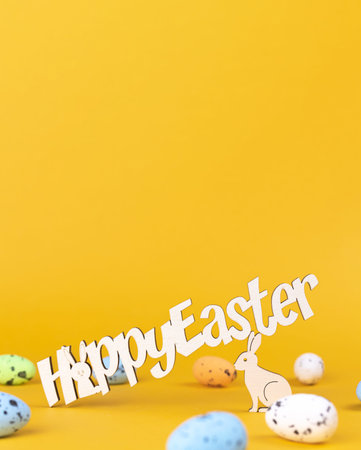 Happy easter text, greeting card background. Spring holiday decorations and colorful eggs, copy...