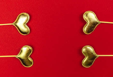 Valentines day border hearts on red background. 14th February, love, greeting concept, top view and copy spaceの写真素材