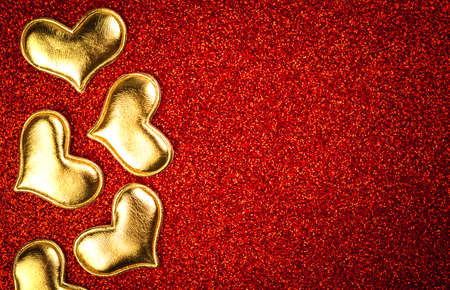 Valentines day flat lay design. 14th February celebration, red glitter background with copy spaceの写真素材