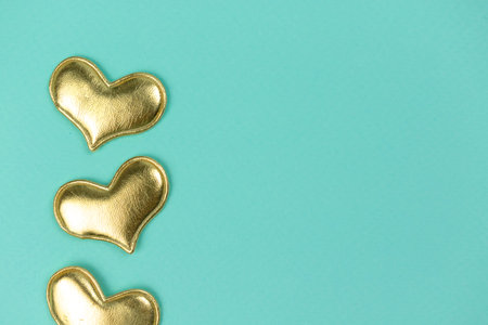 Valentine day greeting concept hearts decoration on bright background top view, copy space. flat layの写真素材