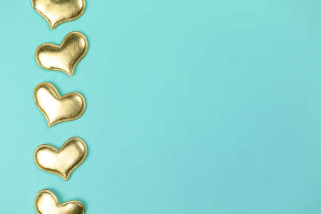 Valentine day greeting concept hearts decoration on bright background top view, copy space. flat layの写真素材