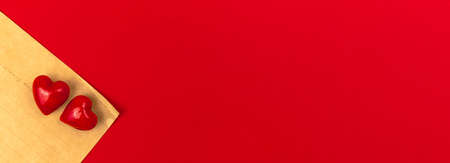 Vintage letters with red Valentines Day hearts on bright banner background, Flat lay, top view and copy spaceの写真素材