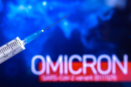 Omicron coronavirus variant. World epidemic background with syringe. COVID-19, Sars-ncov-2, 2021...