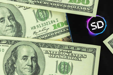 Kharkov, Ukraine - January 27, 2022: Stader token and money. New crypto currency, digital money and virtual trade business conceptのeditorial素材