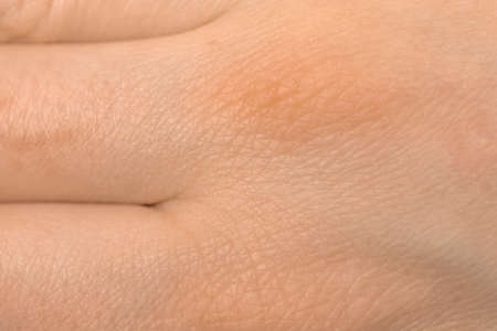 human hand skin texture. Detail healthy pink skin backgroundの写真素材