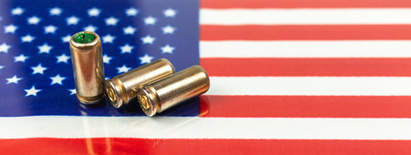 Gun bullets over the American flag, banner. Criminal and crime, corruption and punishment concept....