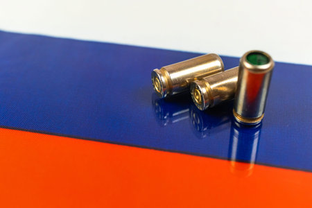 Gun bullets over the Russian flag. Criminal and crime, corruption and punishment concept. Russian...