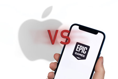 Epic Games vs Apple . App Store vs Epic Store concept photo