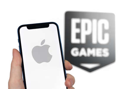 Apple versus Epic Store . Big company competition concept, business and finance background photoのeditorial素材