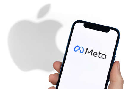 Meta and Apple on mobile phone screen closeupのeditorial素材