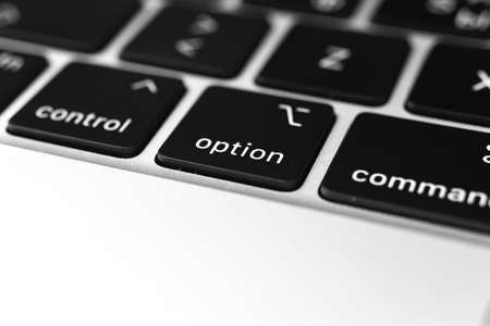Option key and button on keyboard. Option sign close-up. Modern laptop, communication conceptの写真素材