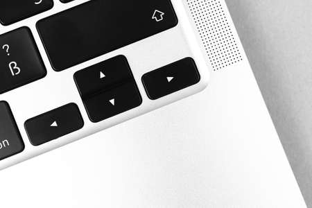 Arrow key and button on keyboard. Arrow sign close-up. Modern laptop, communication conceptの写真素材